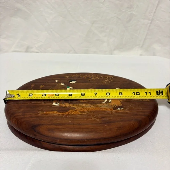 Vintage Indian rosewood wall art plaques with intricate bone inlay designs.